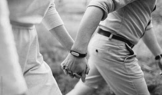 Couple holding hands - Grey BG